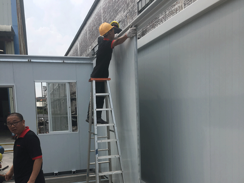 Color steel sandwich panels were installing on the worksite.
