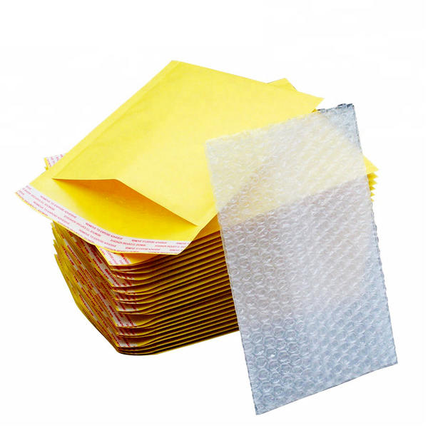 Venta al por mayor personalizado lujo lujo impreso natural acolchado papel liso amarillo kraft burbuja sobres