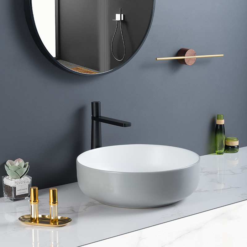 Lavabo de baño gris gris de baño de cerámica redonda de diseño de lujo con superficie acristalada mate