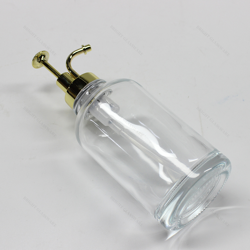 Botella redonda de champú de bomba transparente