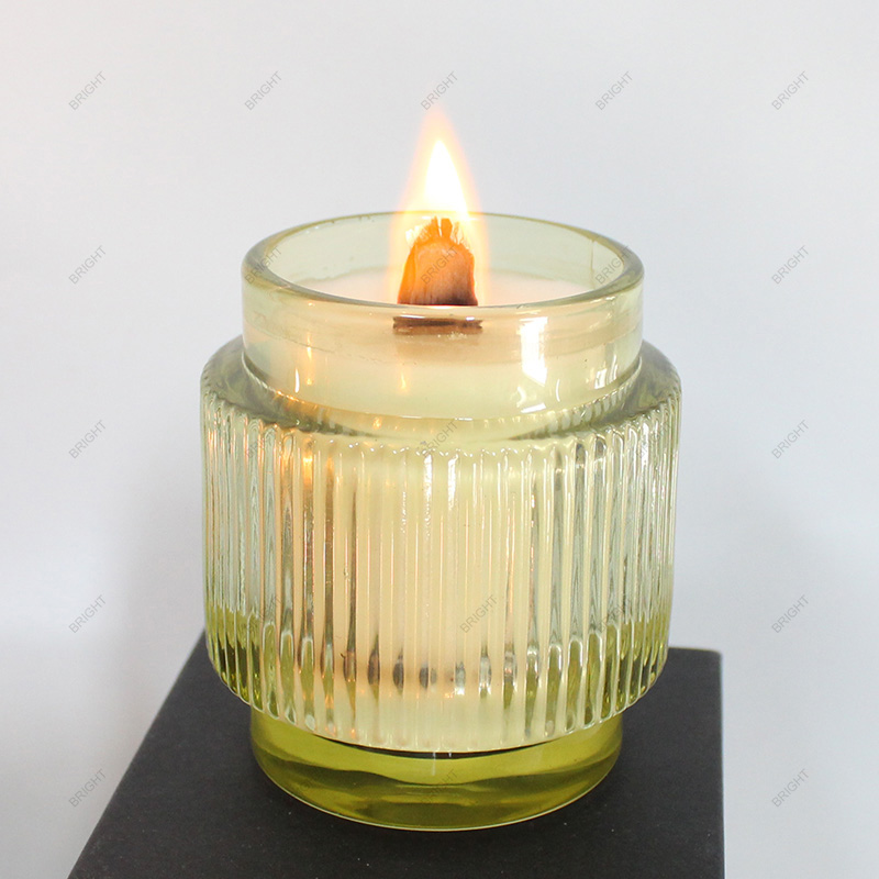 Green round glass candle jar