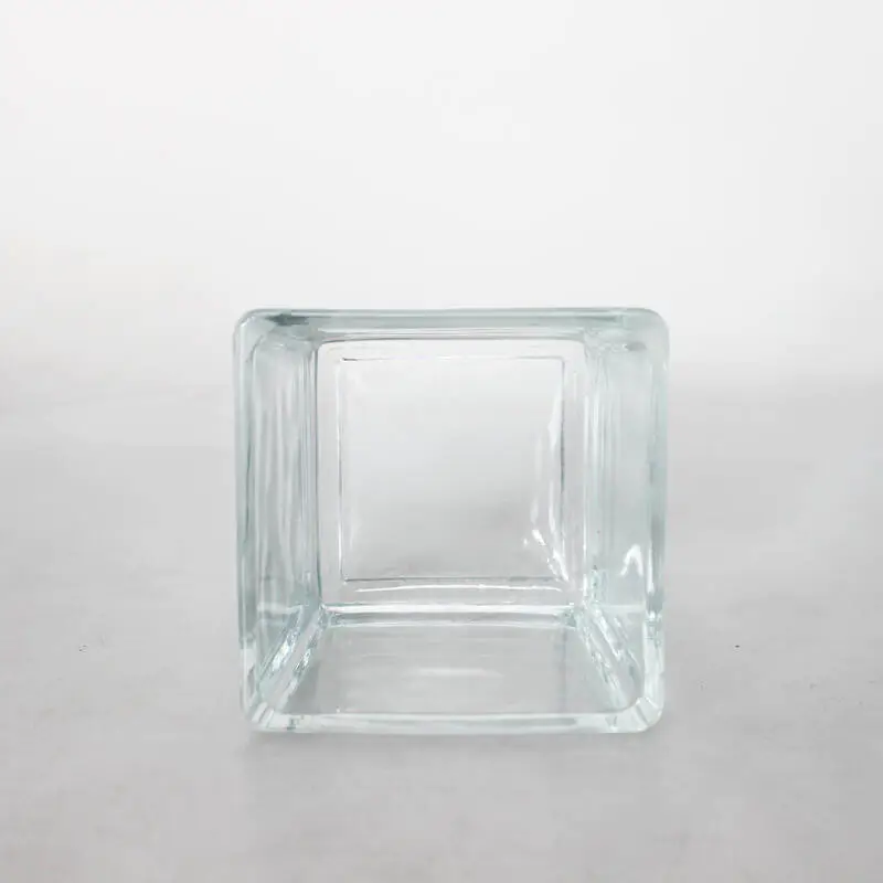 Fábrica al por mayor 560 ml Contenedor de velas transparente cuadrado cuadrado frascos de velas de vidrio para la decoración del hogar
