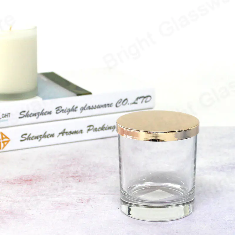 Vente en gros de bocaux de bougies en verre transparent avec couvercles en or pour la décoration intérieure