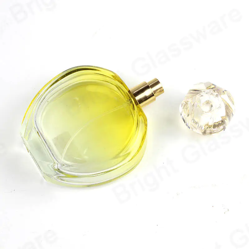 アトマイザースプレー付きのヴィンテージトラベル詰め替え可能な丸いガラス香水瓶