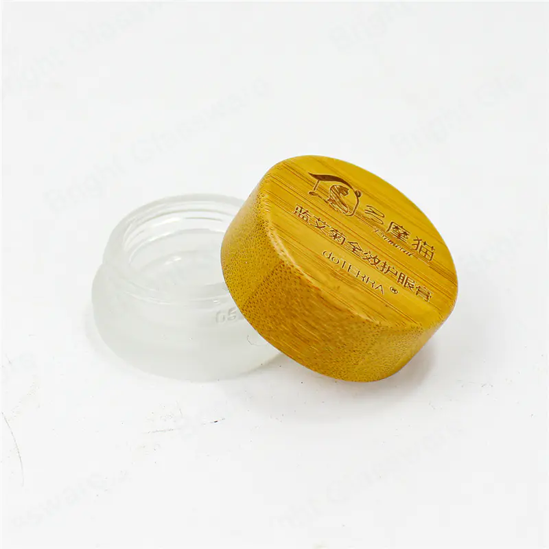Venta al por mayor recipiente cosmético de vidrio vacío frasco de crema de vidrio esmerilado con tapa de bambú