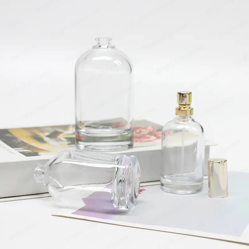 Botella de perfume de cristal vacío de vidrio transparente clásico de forma redonda personalizada con fondo grueso