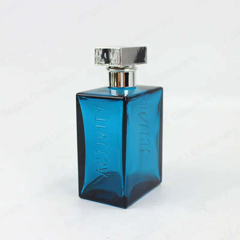 El nuevo logotipo personalizado cuadrado botella de perfume de vidrio negro azul con tapa para el cuidado de la piel