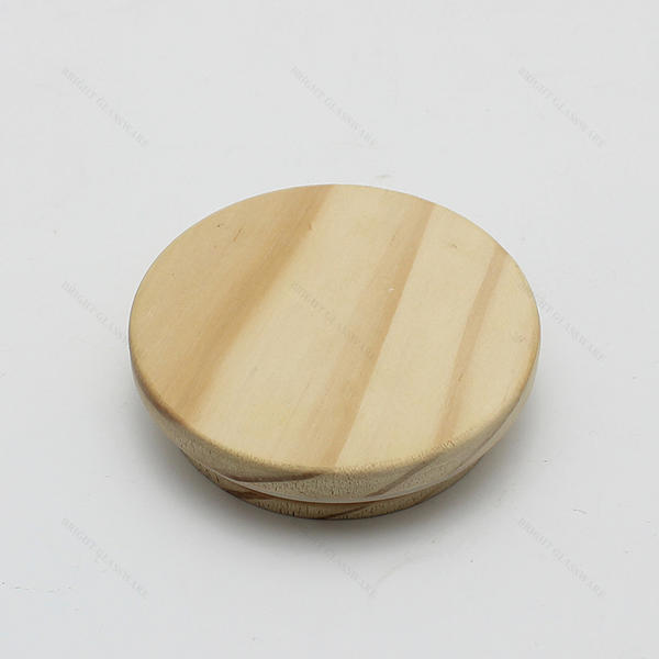 卸し売り注文のロゴのパターンの円形の蝋燭の木製のふたの蝋燭作りのための松の木