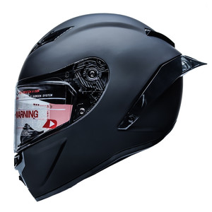Full face motorcycle helmet with rear wing