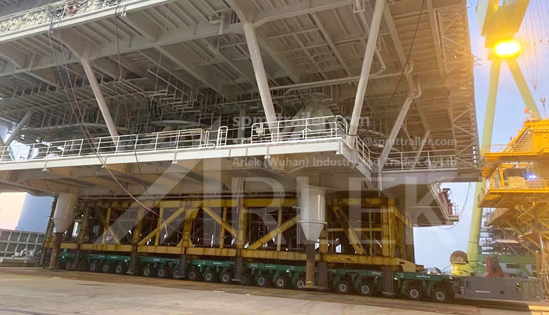 Multiple SPMT systems combined to transport an 800-ton steel hydraulic station