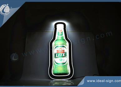 boîte lumineuse en forme de bouteille