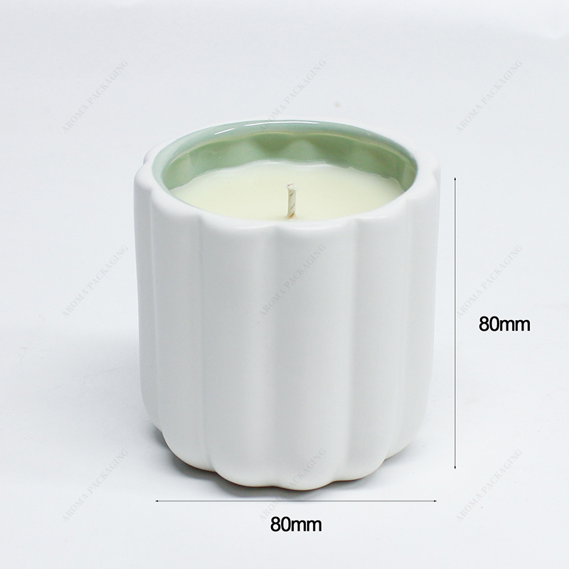 Embossed ceramic candle jar
