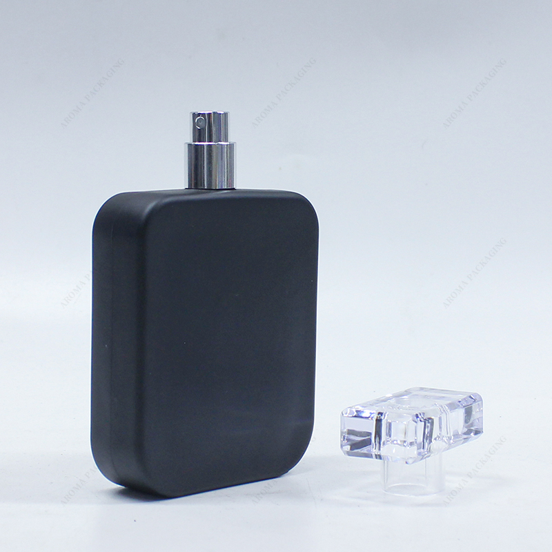 Black glass perfume bottle with lid