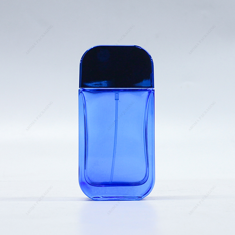 Frasco de perfume de vidrio azul de 55 ml con tapa