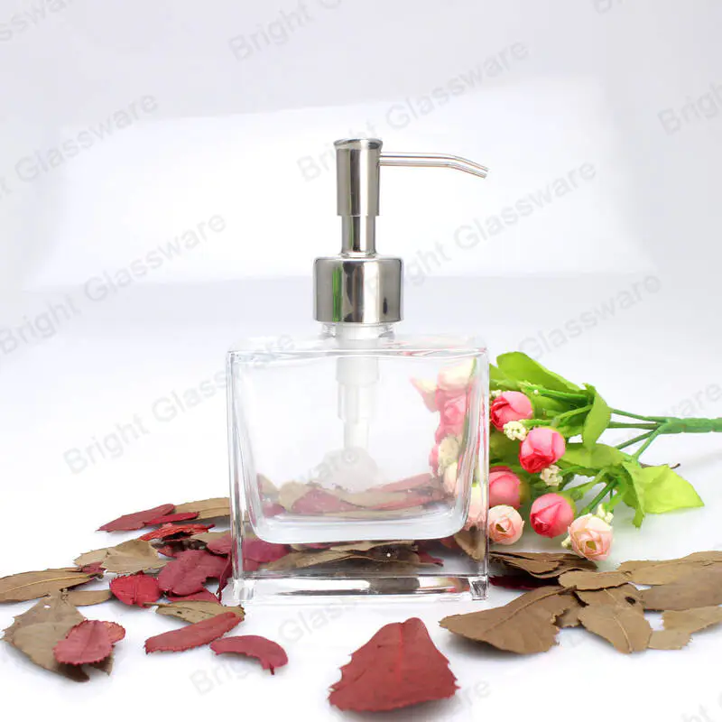 bathroom use empty glass hand sanitizer bottle square shaped with stainless steel lotion pump dispenser 
