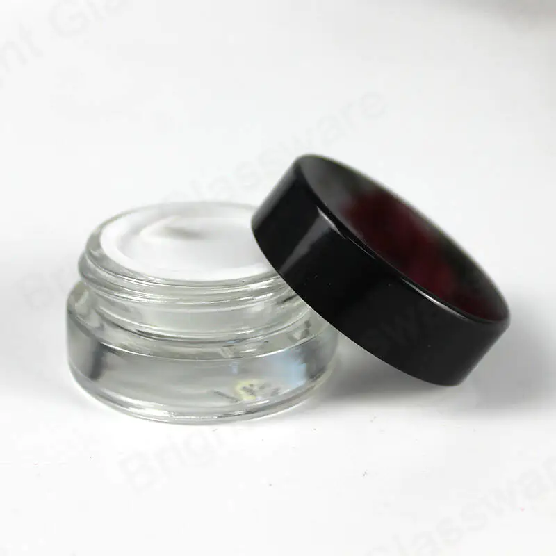 Factory cheap price stocked 5ml 10ml 20ml 25ml 30ml 85ml amber glass cosmetic jars with black plastic cap wholesale