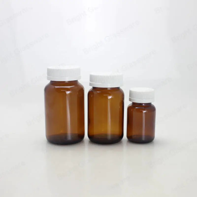 wide mouth empty pharmacy bottles amber pharmaceutical medical glass bottle with white plastic screw lids