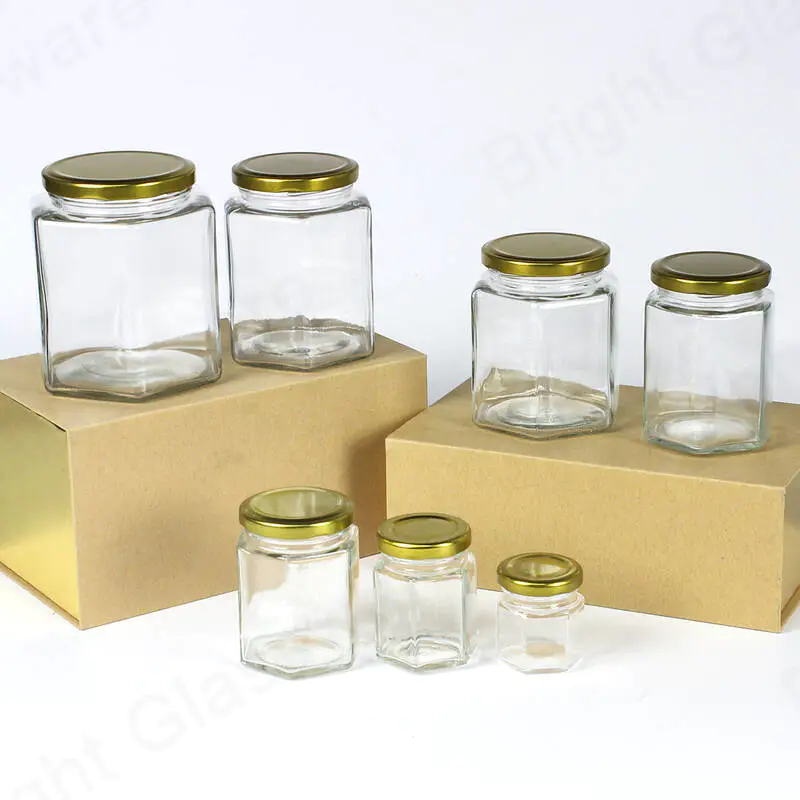 スクリュー蓋付き中国サプライヤー安い六角形ガラス蜂蜜瓶