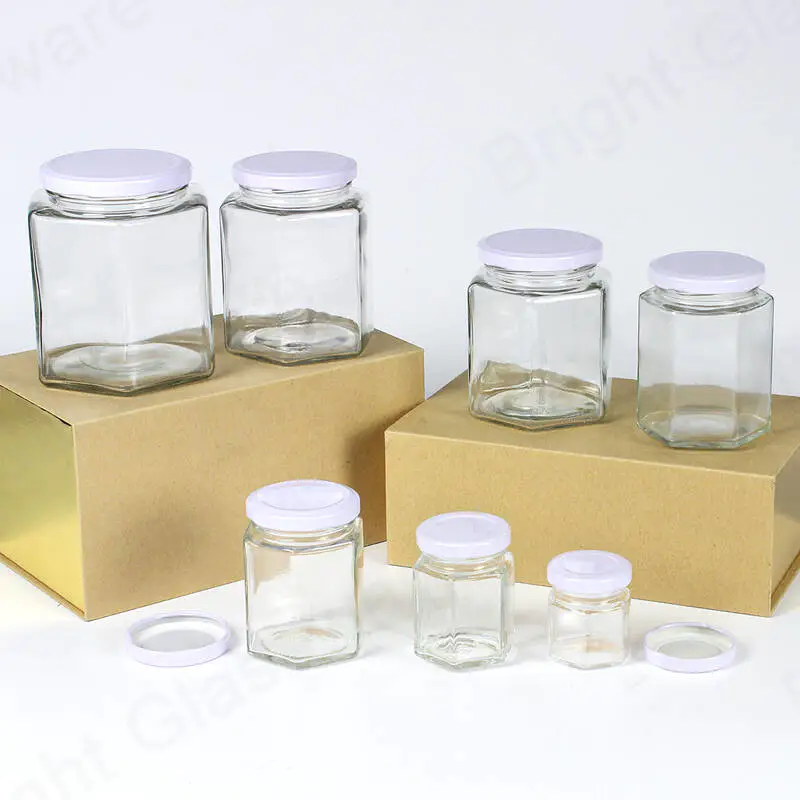 蜂蜜、ジャム、スクリューメタルキャップ卸売付き缶詰食品用の六角形ガラス瓶