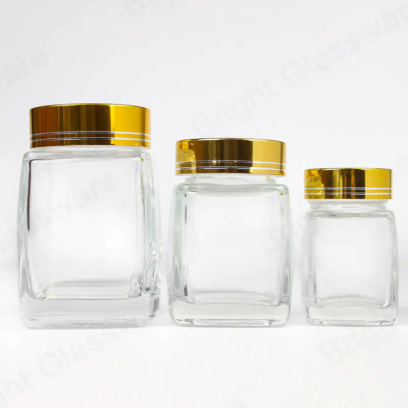 50ml 100ml 200ml square shape spice glass jar empty honey jars wholesale with gold/silver cap