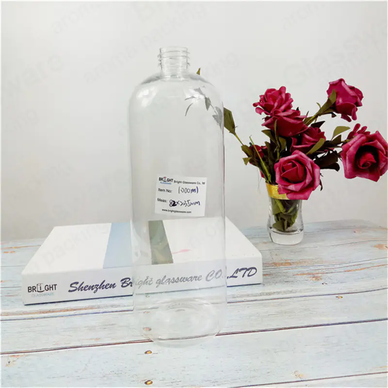 botella de plástico vacía de 1L transparente barata con bomba o pulverizador de gatillo para champú