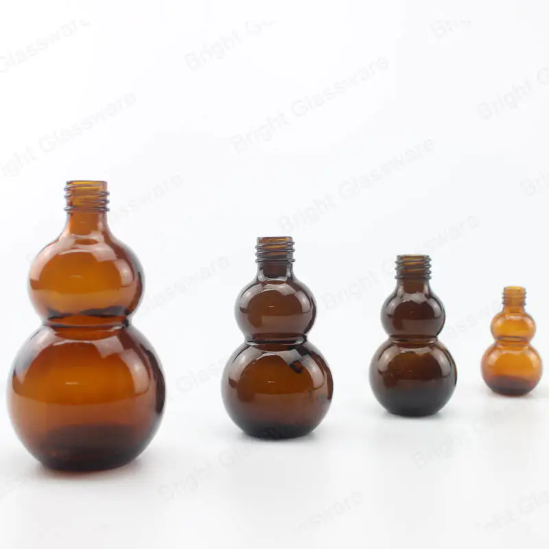 10ml 20ml 30ml 50ml en verre gourde cucurbitacée bouteille en forme de cucurbitacée pour huile essentielle impression de logo personnalisée