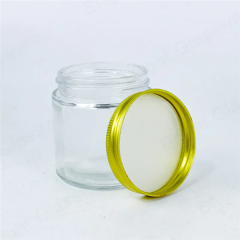 Frasco de vidrio transparente de 4 oz con tapa dorada para almacenamiento en la cocina