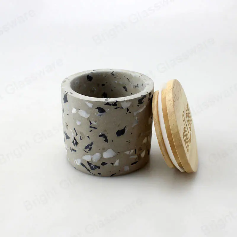 灰色混凝土蜡烛罐与木盖水磨石花盆