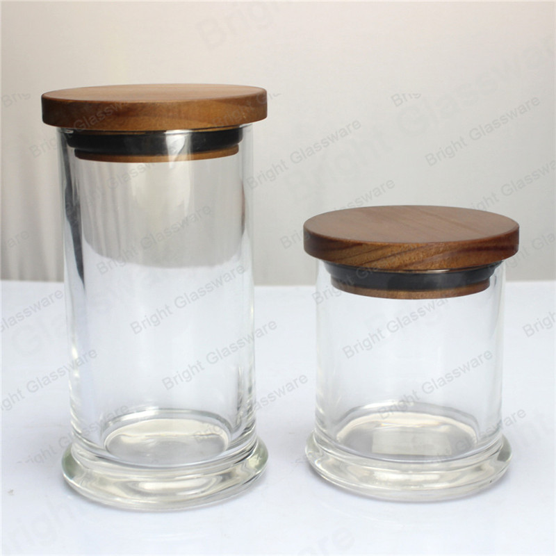 sealed clear glass apothecary jar with wood lid