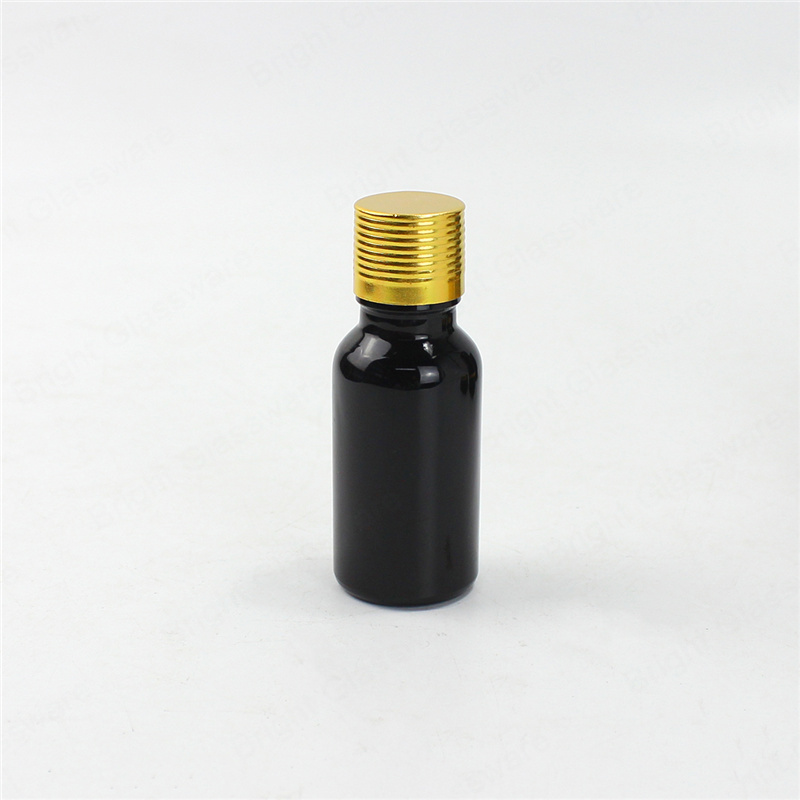 Flacons d’huiles essentielles en verre noir avec bouchon à vis en aluminium