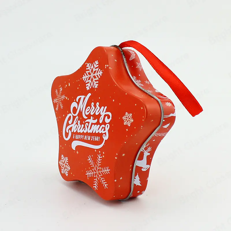 Boîte en fer blanc en forme d’étoile de Noël Conteneur d’impression personnalisée Boîte d’emballage en métal avec ruban pour cadeau de bonbons