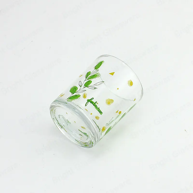 キャンドル作りのための緑の葉のパターンのガラスの蝋燭の瓶