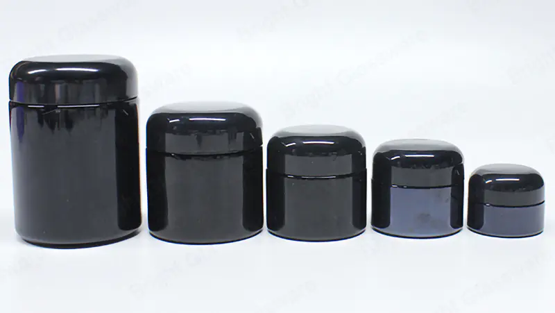 Venta al por mayor de varios tamaños redondos de vidrio negro brillante frasco de crema cosmética con tapa