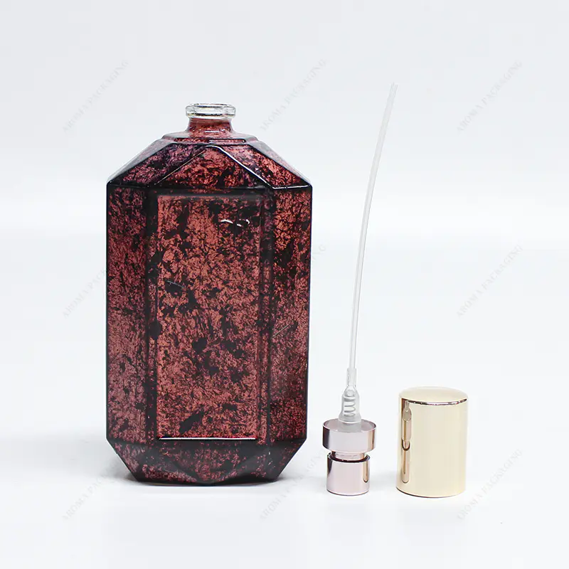 Muestra gratuita 2023 Nueva botella de perfume de vidrio rojo de color en aerosol con tapa y bomba