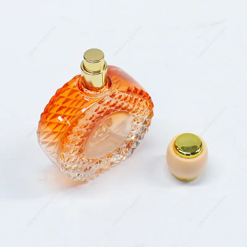 Botella de perfume de vidrio en relieve de color degradado hecha de fábrica GBC273-274 Forma personalizada con tapa