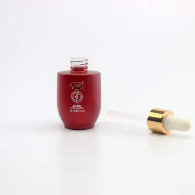 スキンケア用のカスタムキャップ付きの高品質の丸い赤い香水ガラス瓶