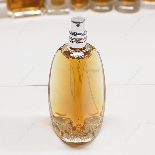 Free Sample Custom Shape 50mm*104mm Glass Perfume Bottle With Pump Cap