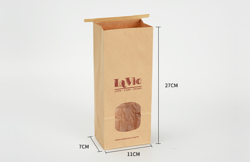 Brown block bottom paper bag with window and tin tie